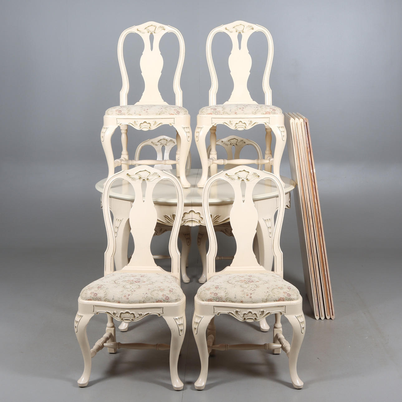 A 7-piece rococo style dining group, 20th century.