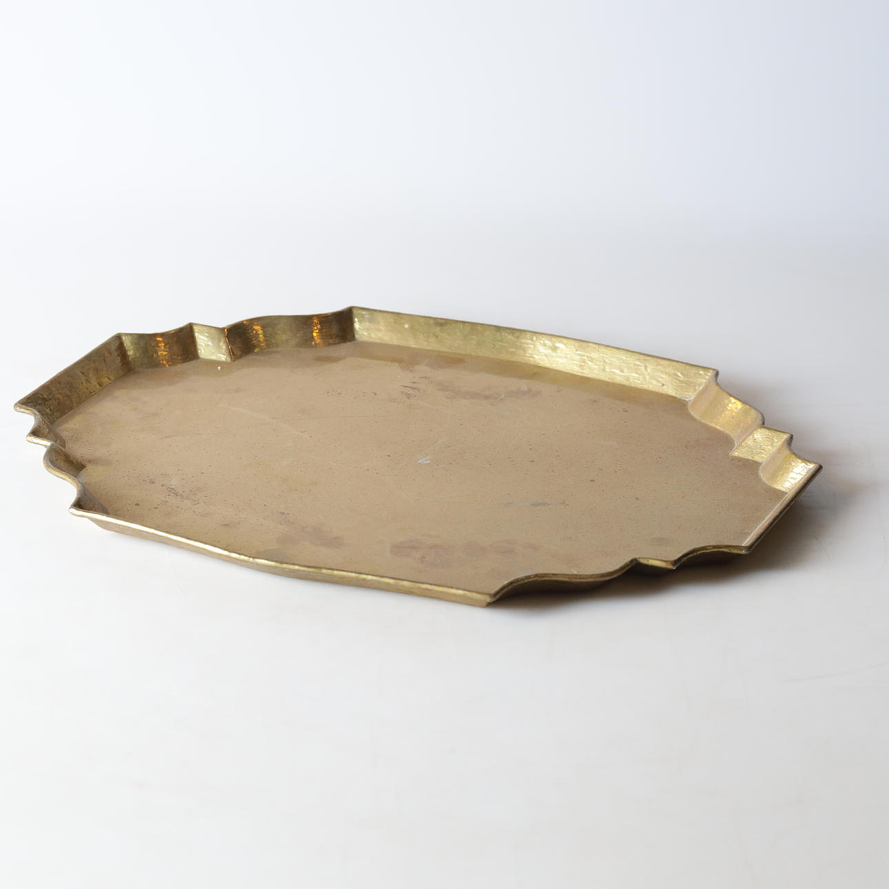 A brass tray, 20th century.