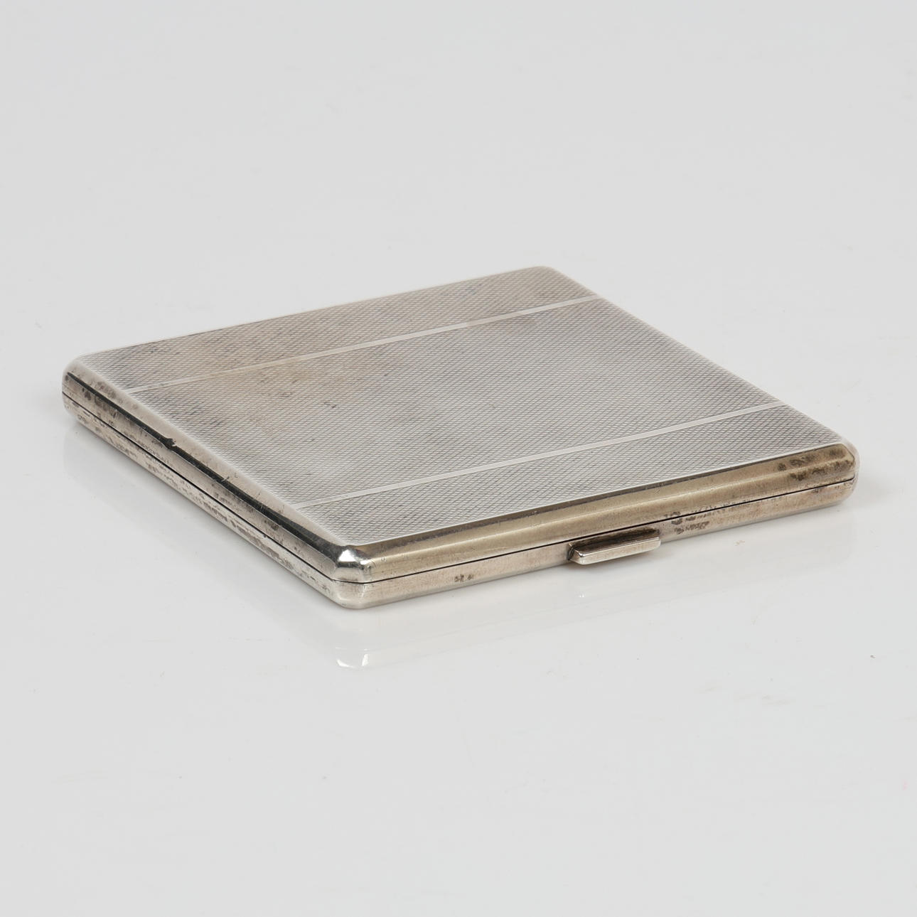 AN EDWARD VIII SILVER CIGARETTE CASE.