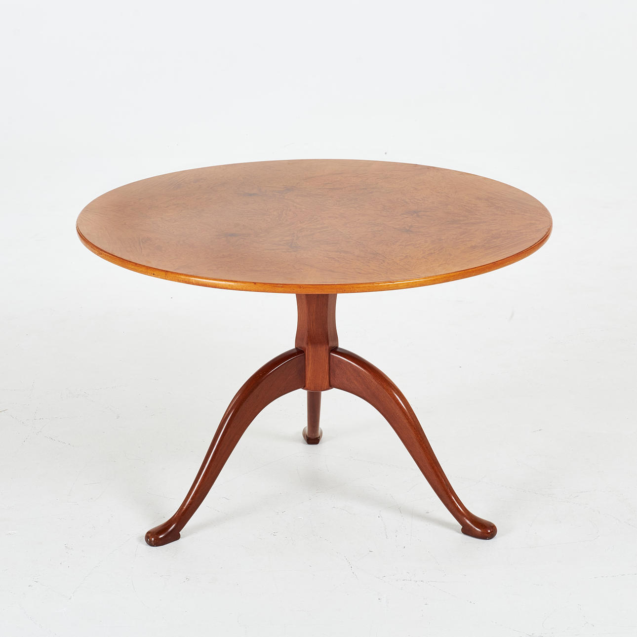 CARL MALMSTEN. Coffee table, “Berg”, central base birch, root veneer, branded CM.