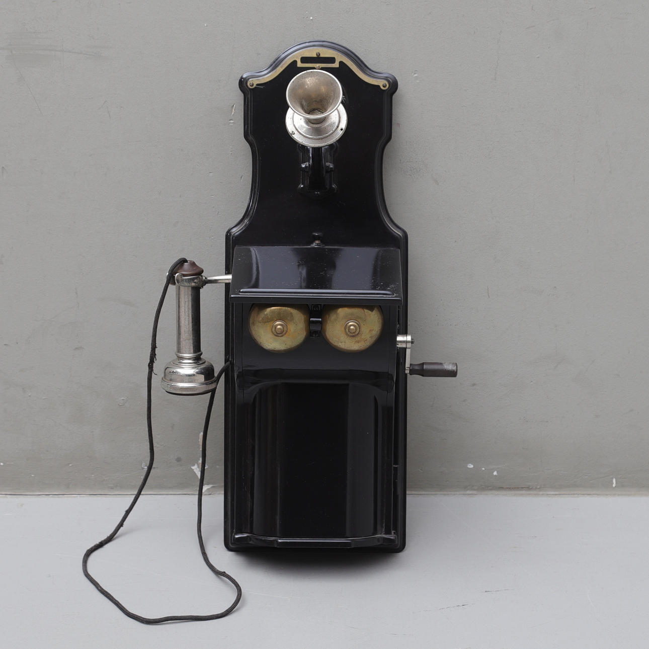 A 1910s Ericsson painted metal telephone.