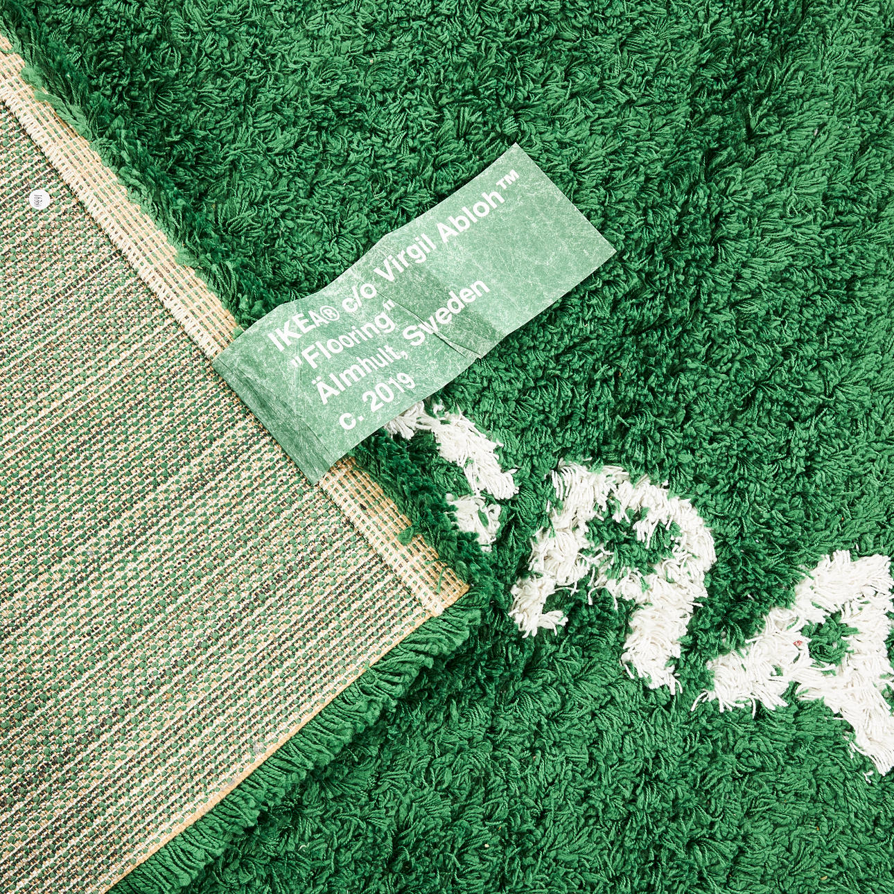 ikea off white rug wet grass