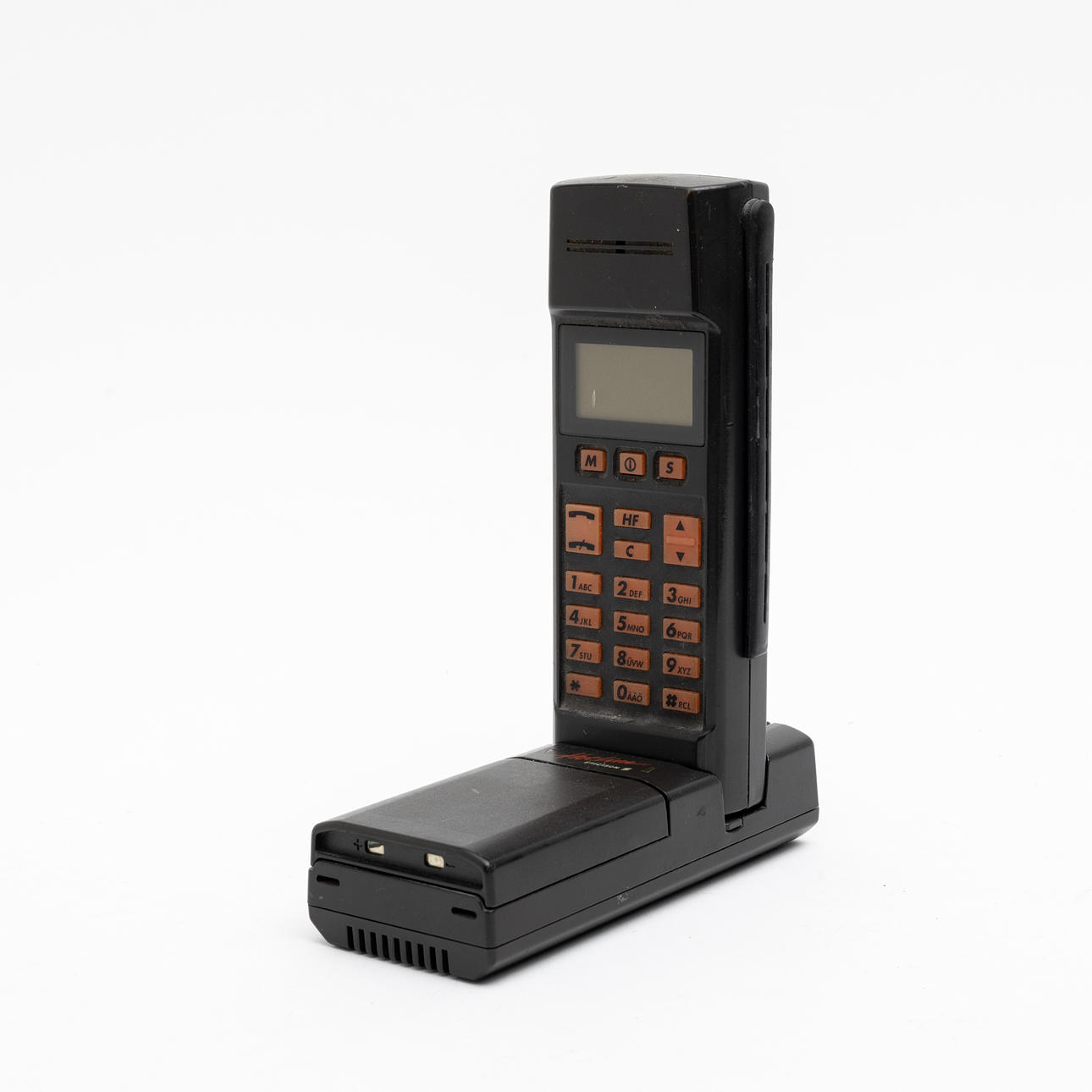 A mobile phone, Ericsson Hotline model 900, 1980s/90s.