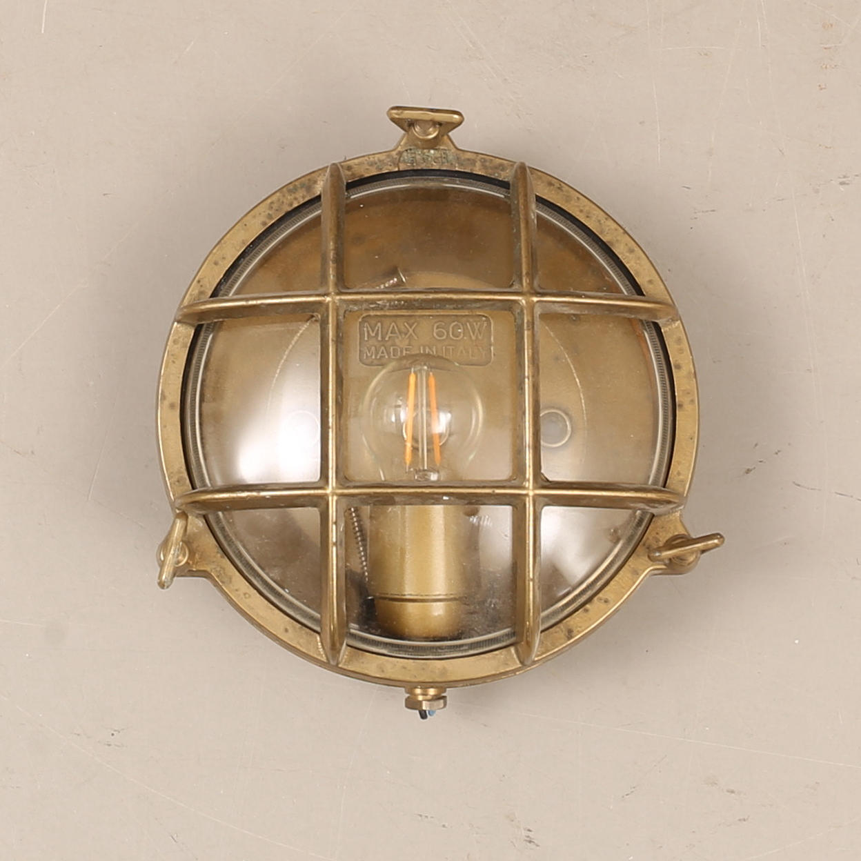 A 20th-century brass ship lamp.
