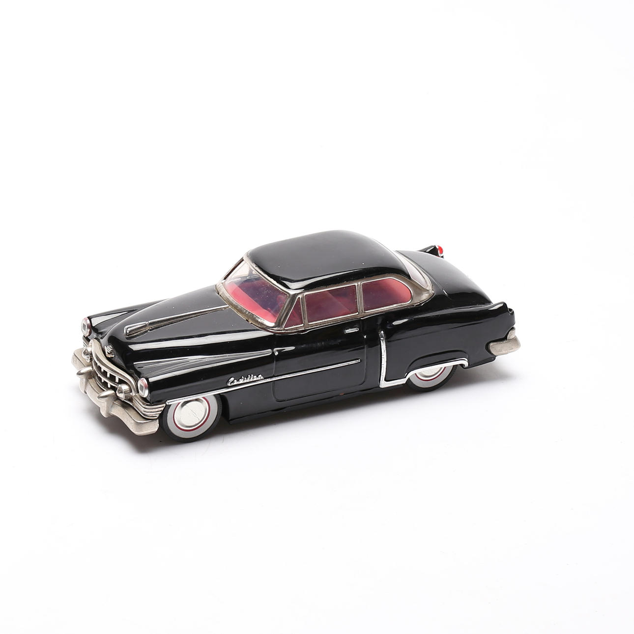 A 20th century toy car, Cadillac.