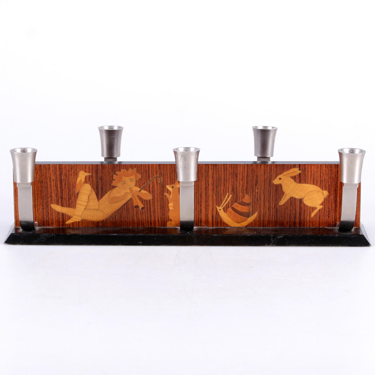 LJUSSTAKE, Mjölby Intarsia, 1900-talets första hälft.