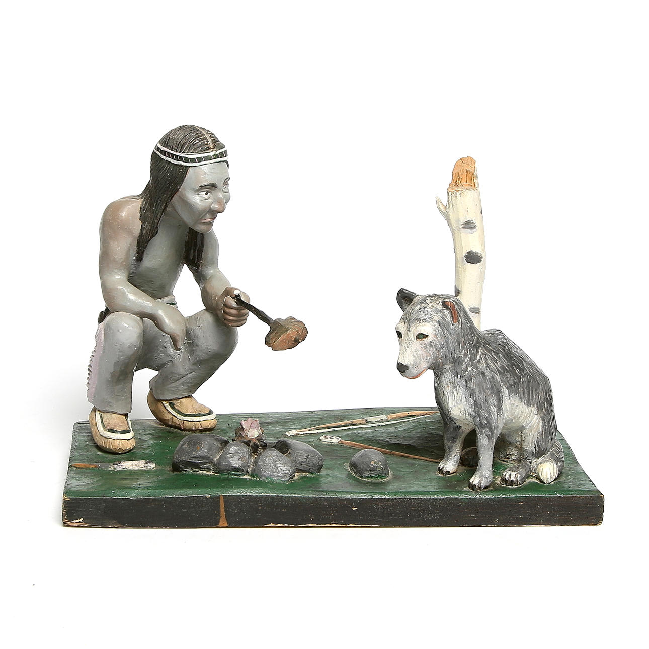 OIDENTIFIERAD KONSTNÄR. Indian med varg vid lägerelden, trä, signerad "A. Sjöberg", 1900-tal.