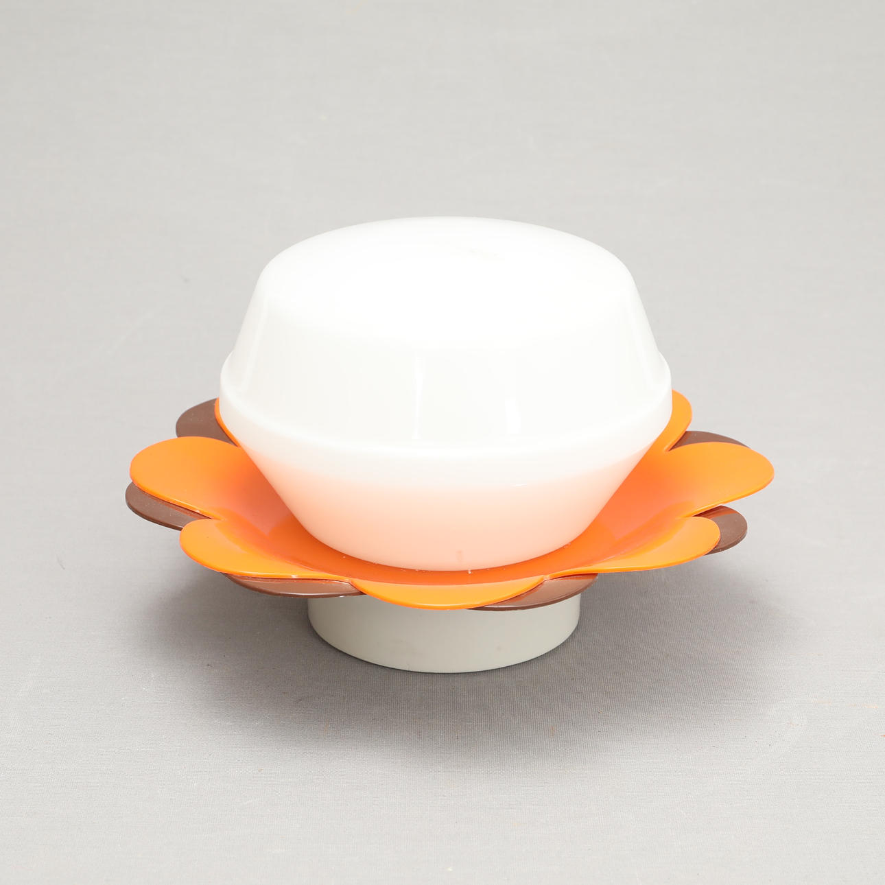 A wall lamp, plastic/glass, 1970s.