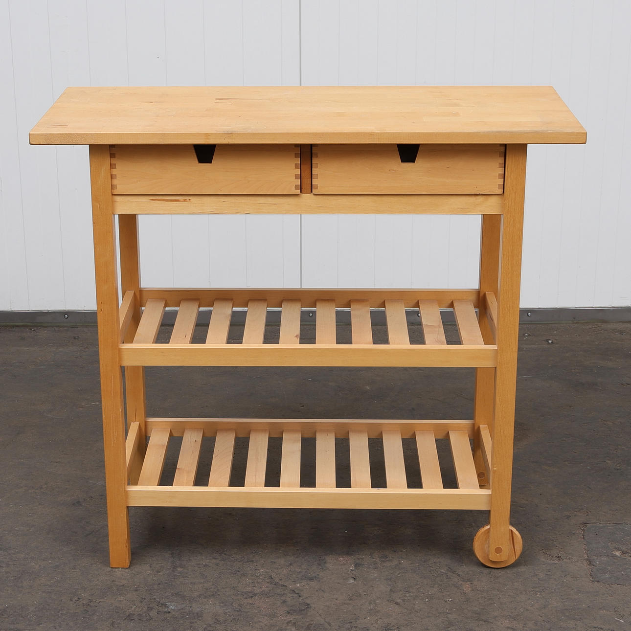 A 200th century IKEA 'Pre-raise' rolling table.