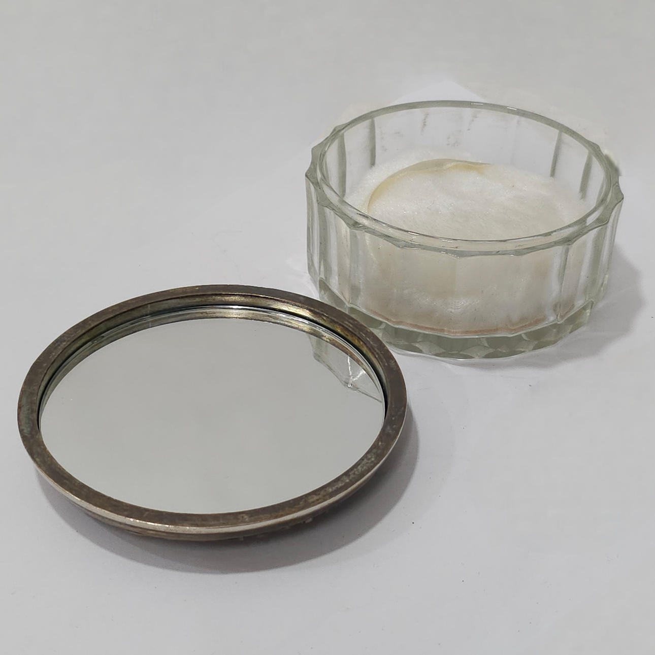 ANTIQUE EMBOSSED ALPACA AND GLASS POWDER.