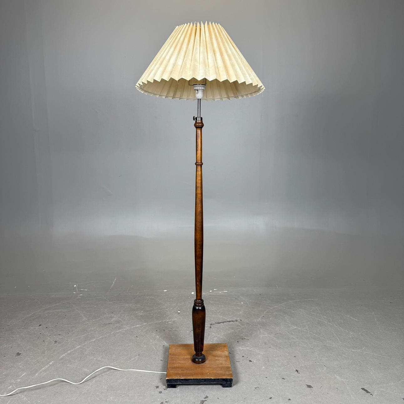 A 1940s hardwood floor lamp.