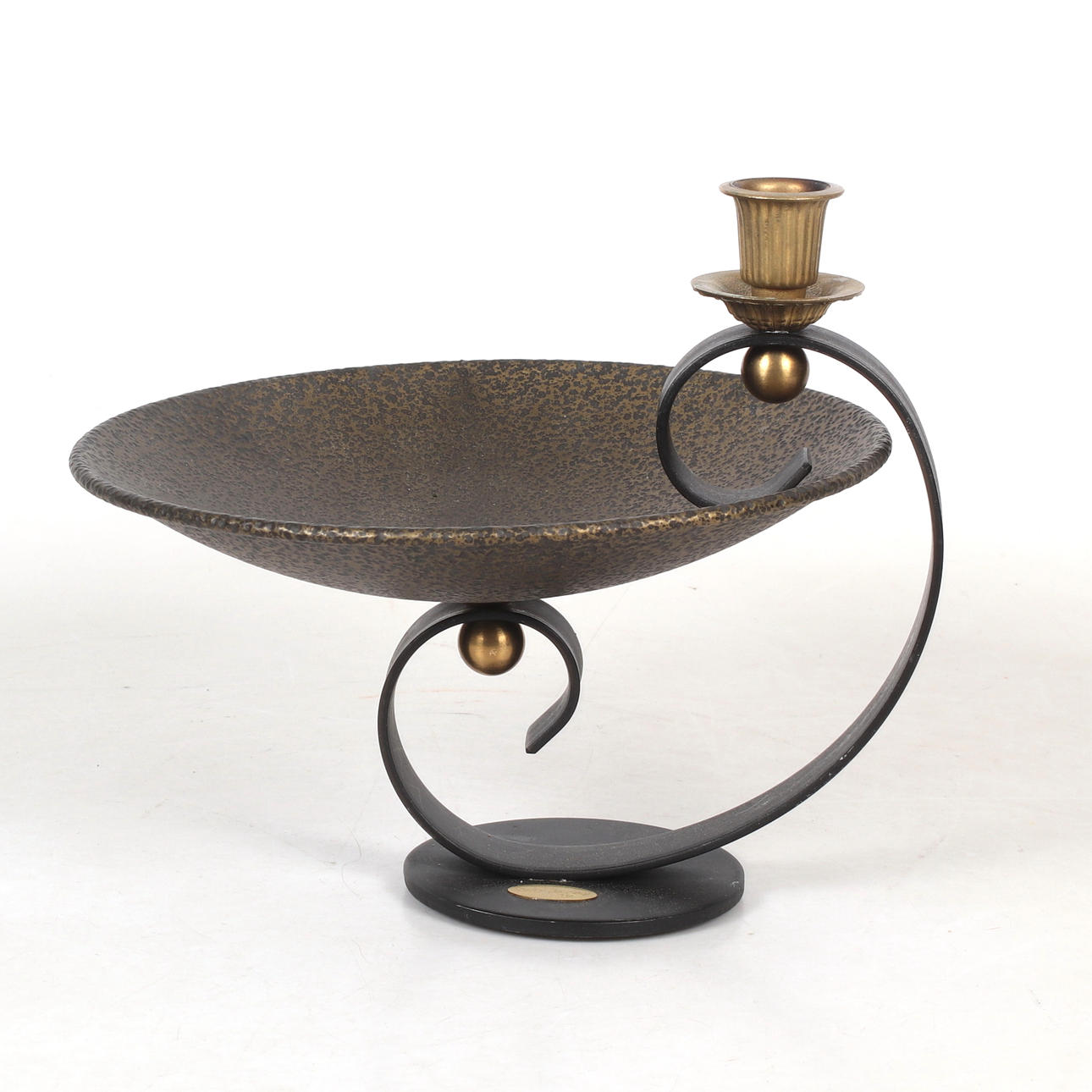 A metal candlestick, Two Faces, 2000s.