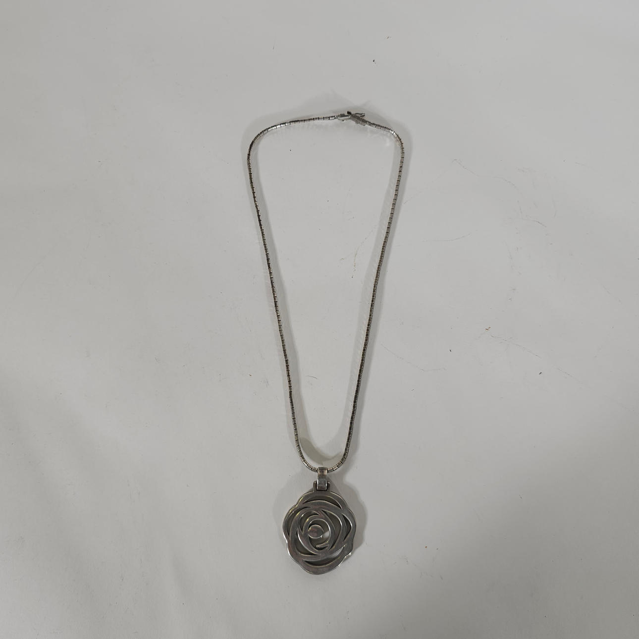 COLGANTE TOUS CON CADENA EN PLATA DE LEY.