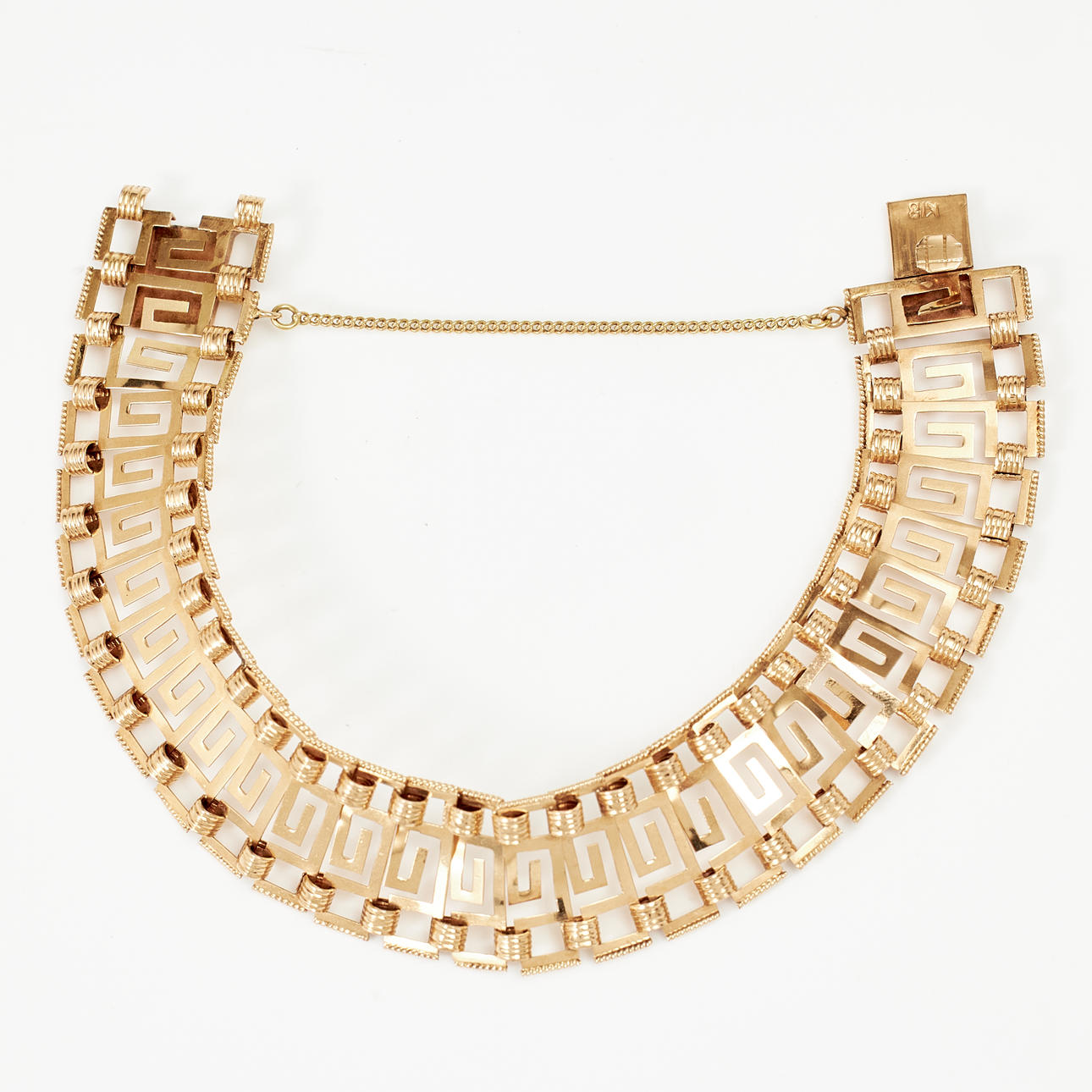 ARMBAND, 18 k guld, dekor av meanderslingan.