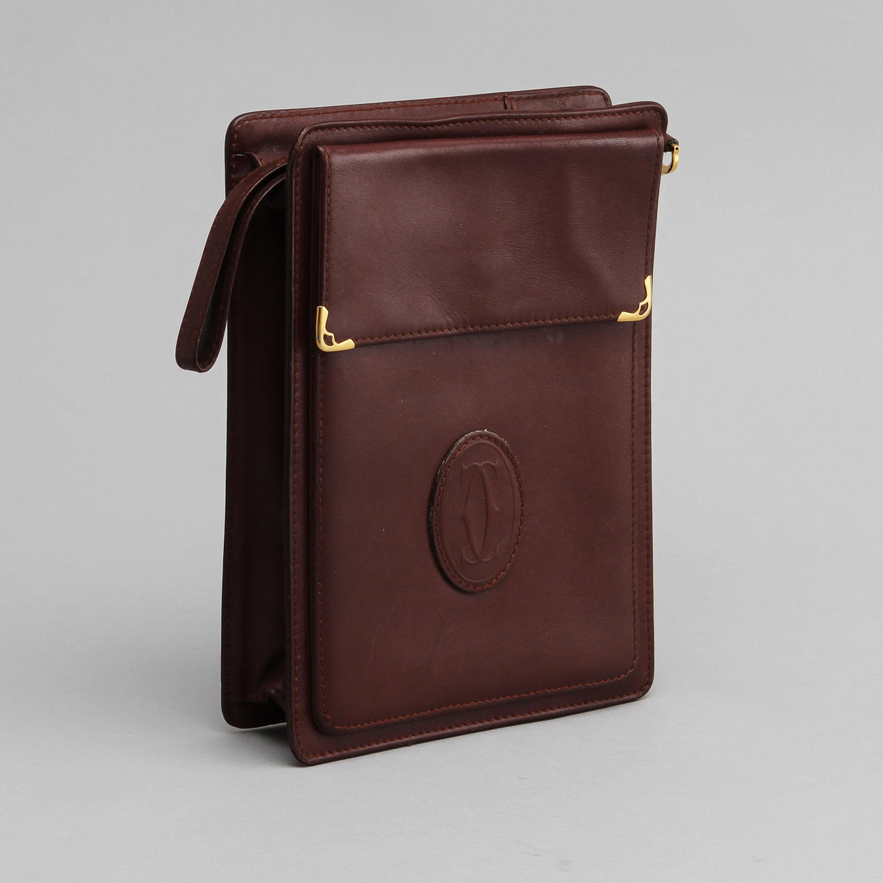 VÄSKA, must de Cartier.