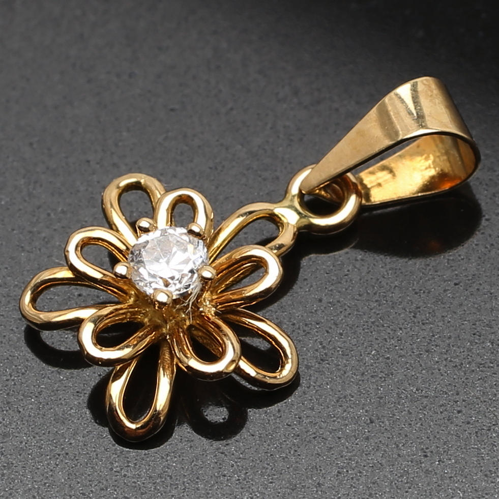 HÄNGE 18 K rödguld med cubic zirkon. Vikt 0,77 g.