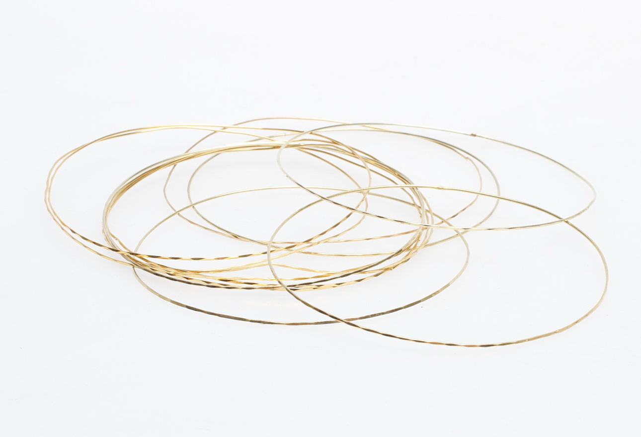 STELA ARMRINGAR, 14 st, 14k guld, vikt ca 8,8 gr.