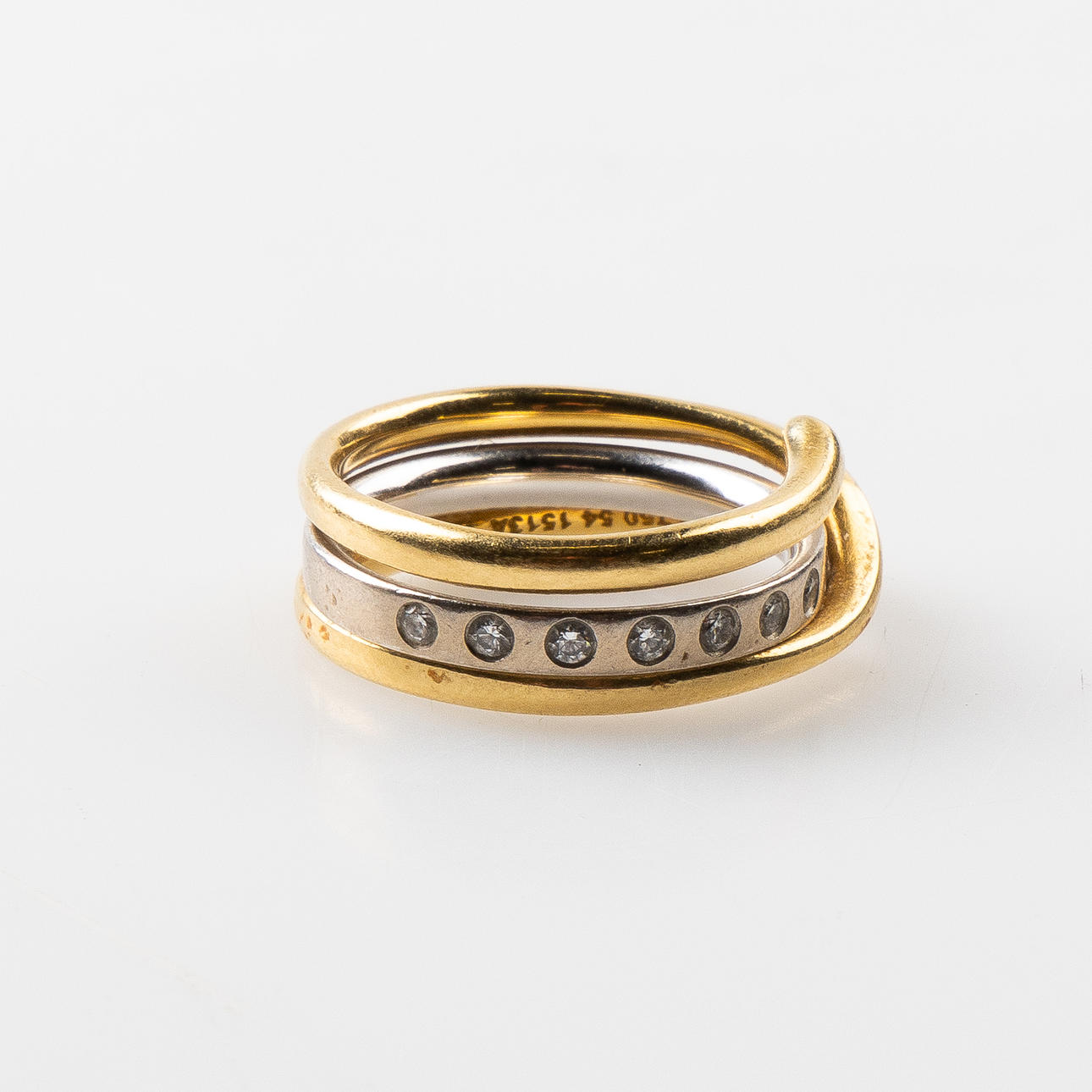 REGITZE OVERGAARD (DANMARK, FÖDD 1946). For Georg Jensen. Combination ring 'Magic'. 18K gold.