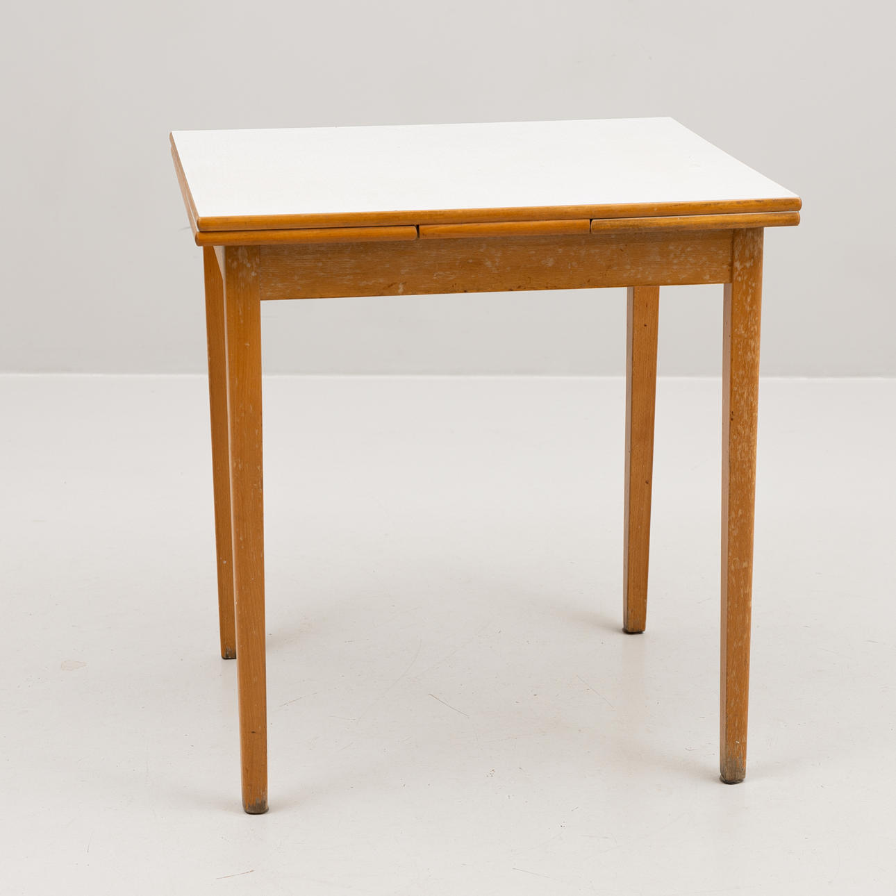A mid-20th century Perstorps plate jumble dining table. Furniture ...