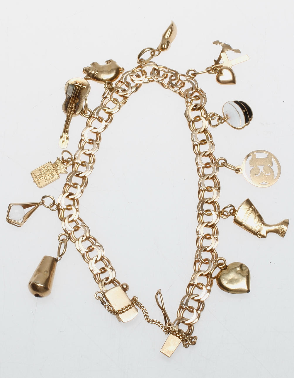 ARMBAND med BERLOCKER, 18k guld, vikt ca 21 gram.