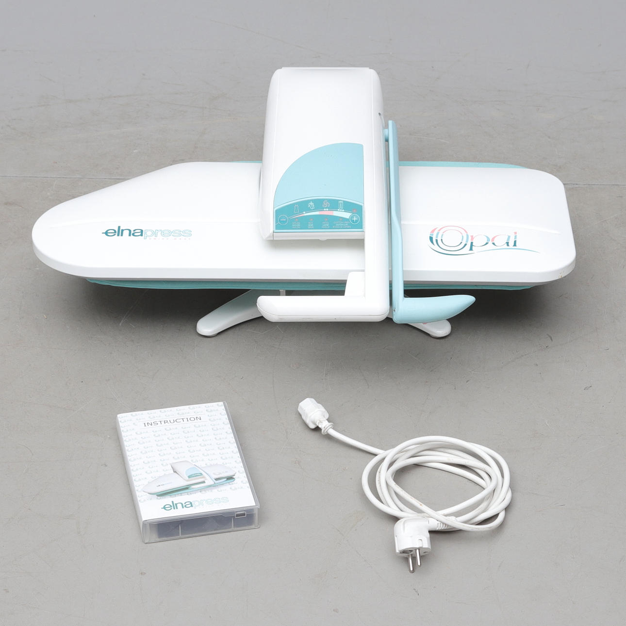 A CLOTHES PRESS, Elnapress Opal, Switzerland.