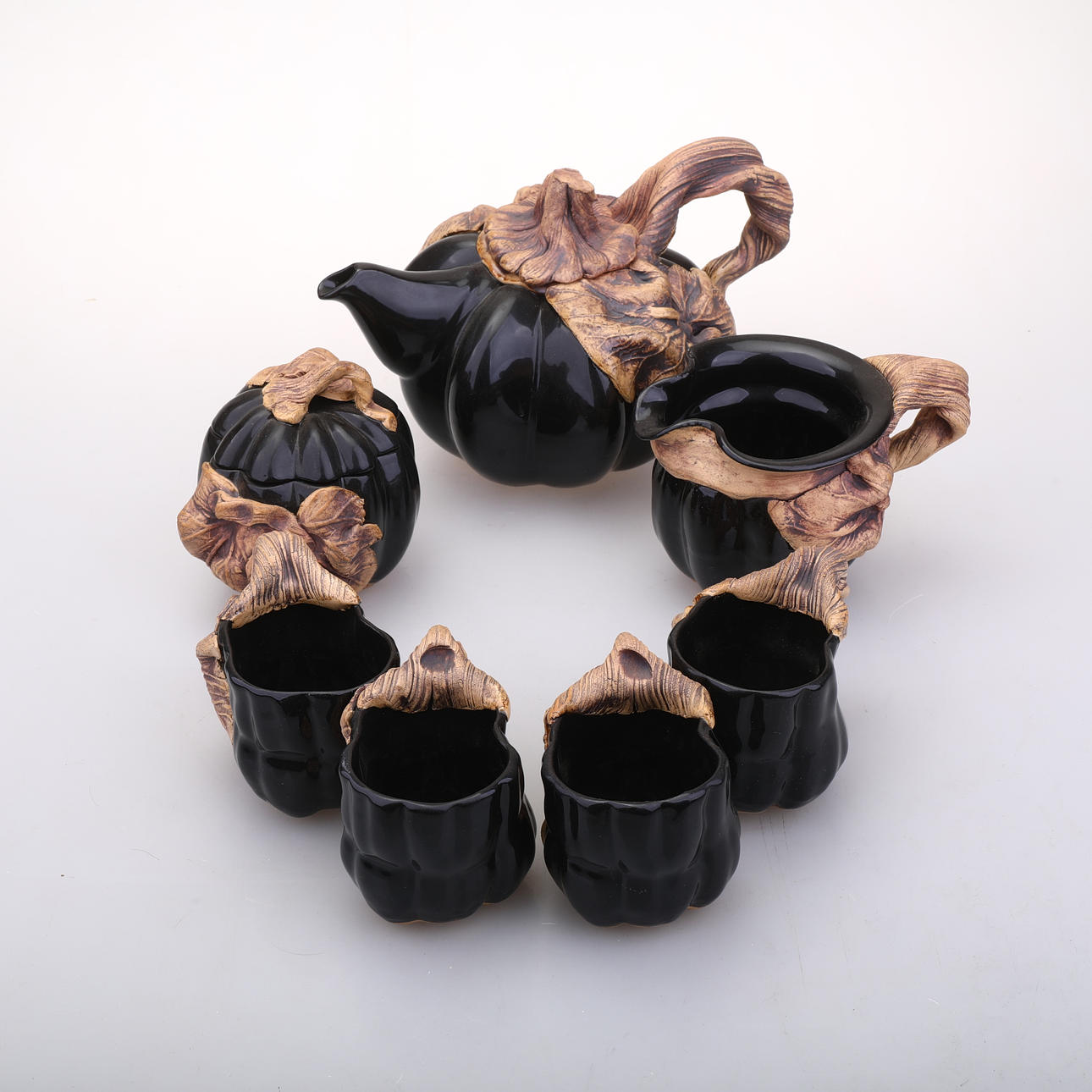 A 7-piece coffee set, signed, Terrafirma pottery, USA.