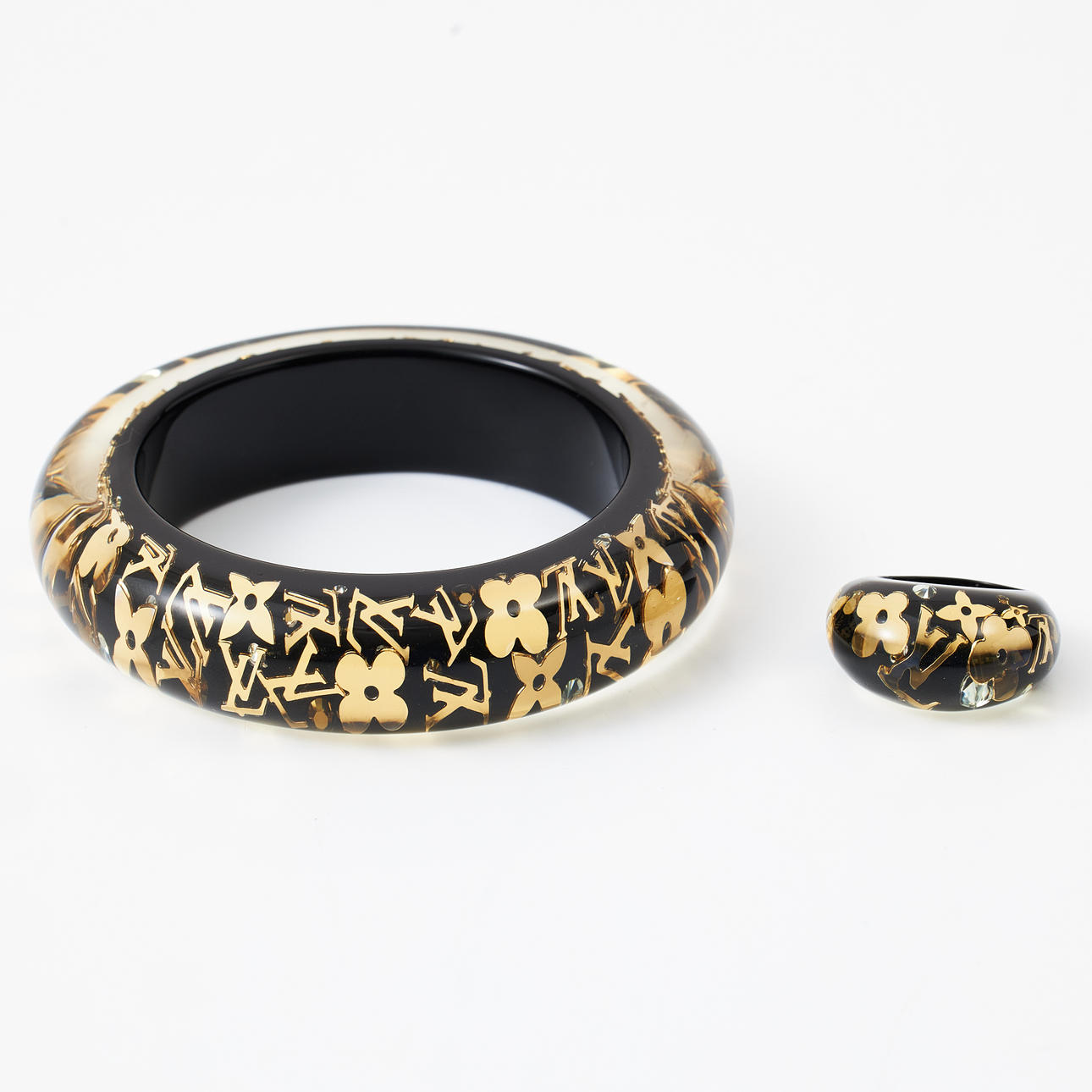 LOUIS VUITTON, bracelet and ring, “Inclusion bangle”.
