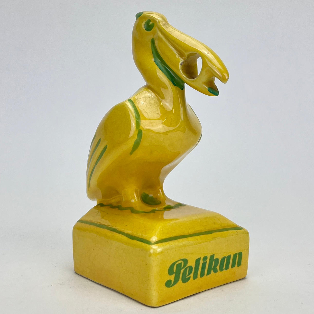 A ceramic pen holder, Pelikan.