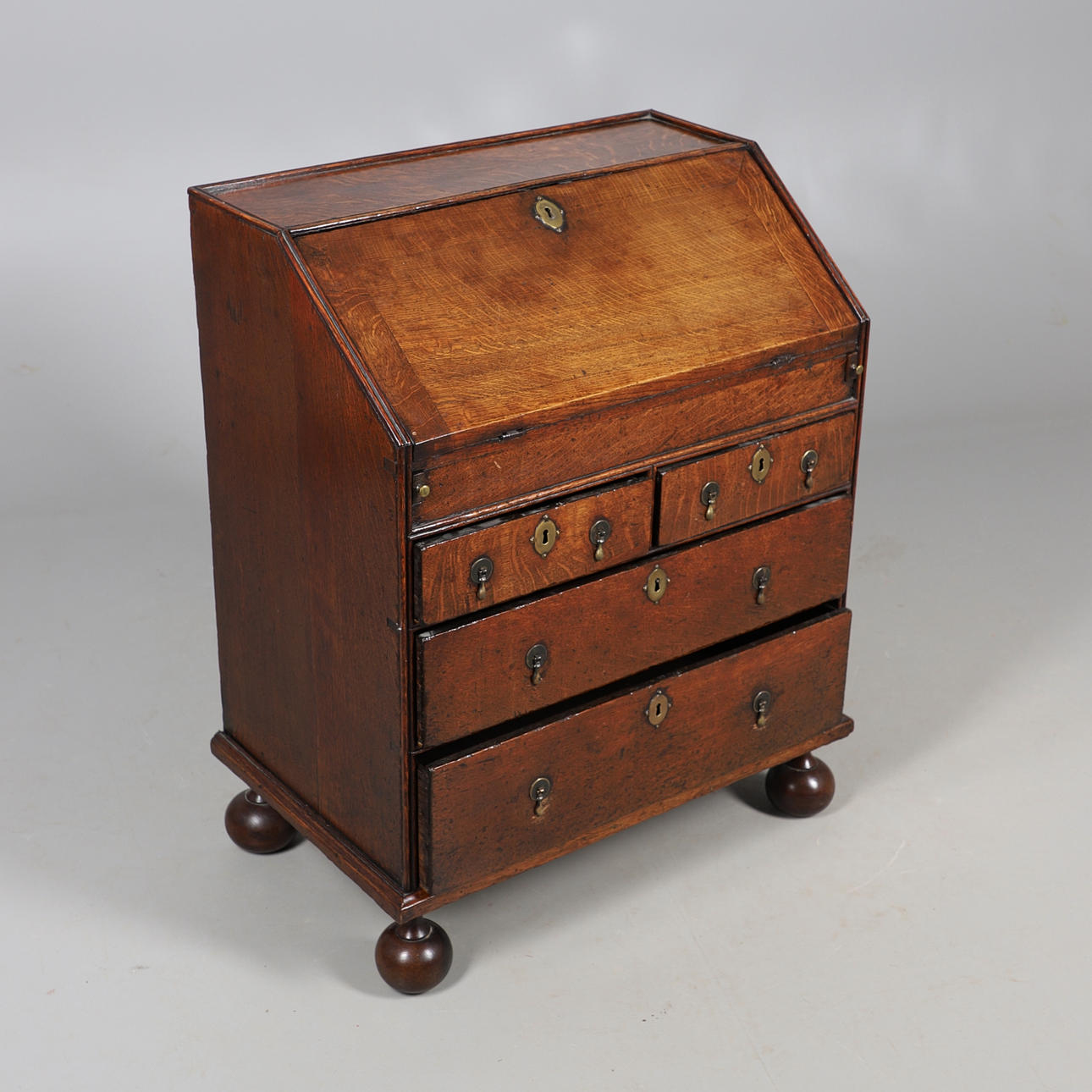 A GEORGE I OAK BUREAU.
