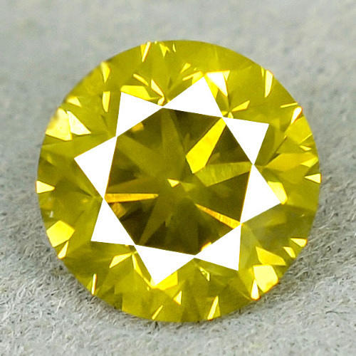 DIAMANT, 1.14 CT. Fancy grönaktig gul.