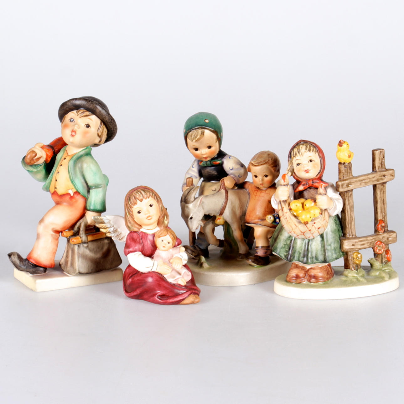 FIGURINER, 4 st. Porslin, MJ Humel, Goebel, Tyskland, 1900-tal.