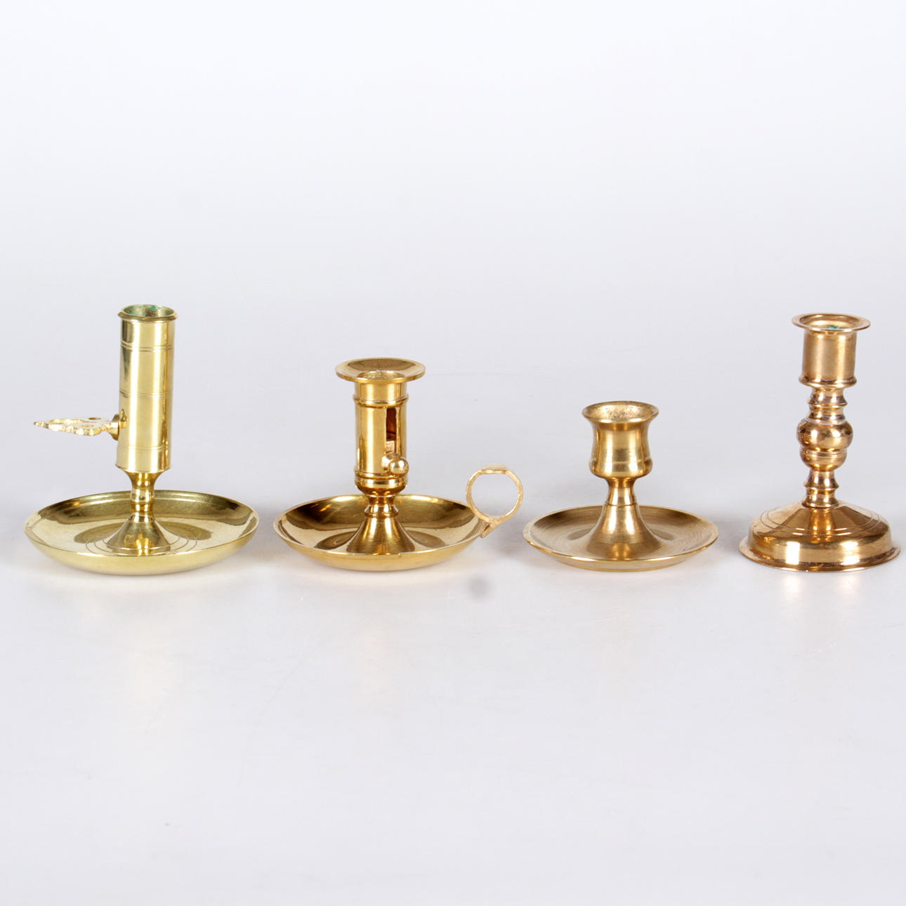 LJUSSTAKAR, 4 par, mässing och malm, 1900-tal.