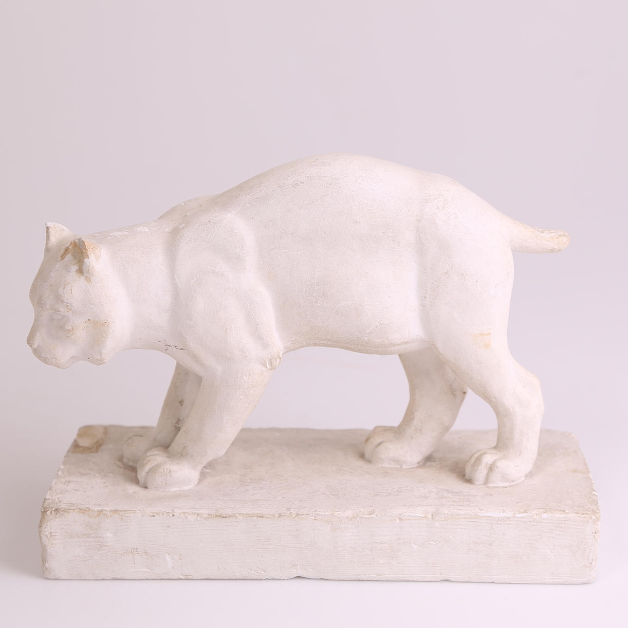 ARVID KNÖPPEL. Statyett, gips, signerad Knöppel, stående lodjur.