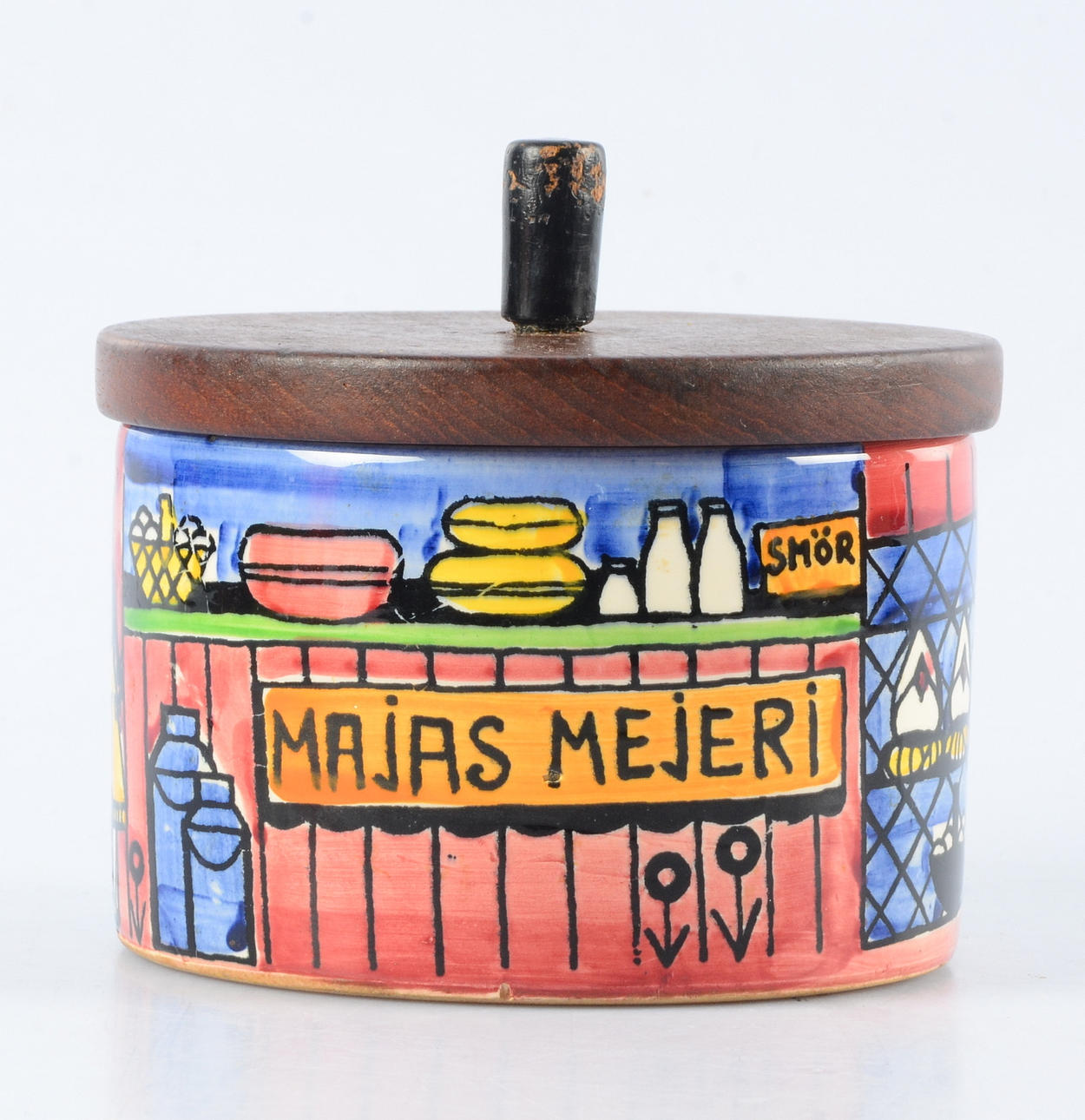 ANITA NYLUND. Burk med lock, "Vår lilla stad, Majas mejeri", bemålad keramik för Jie.