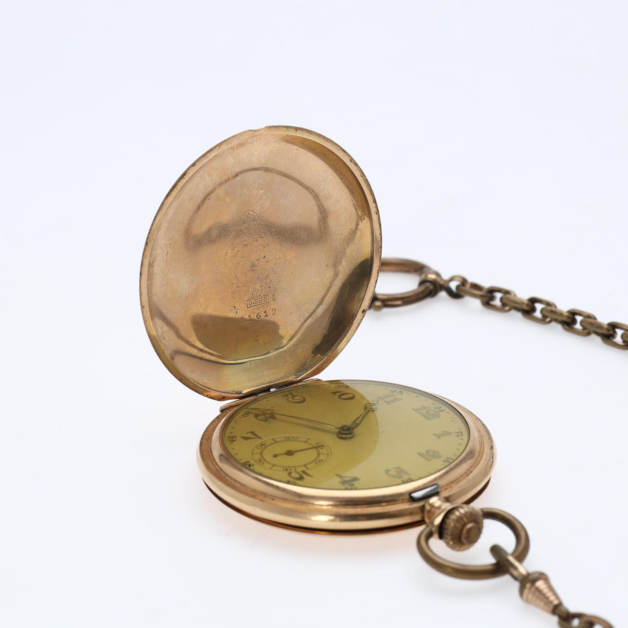 Dobbeltkapslet lommeur af 14 kt. guld.