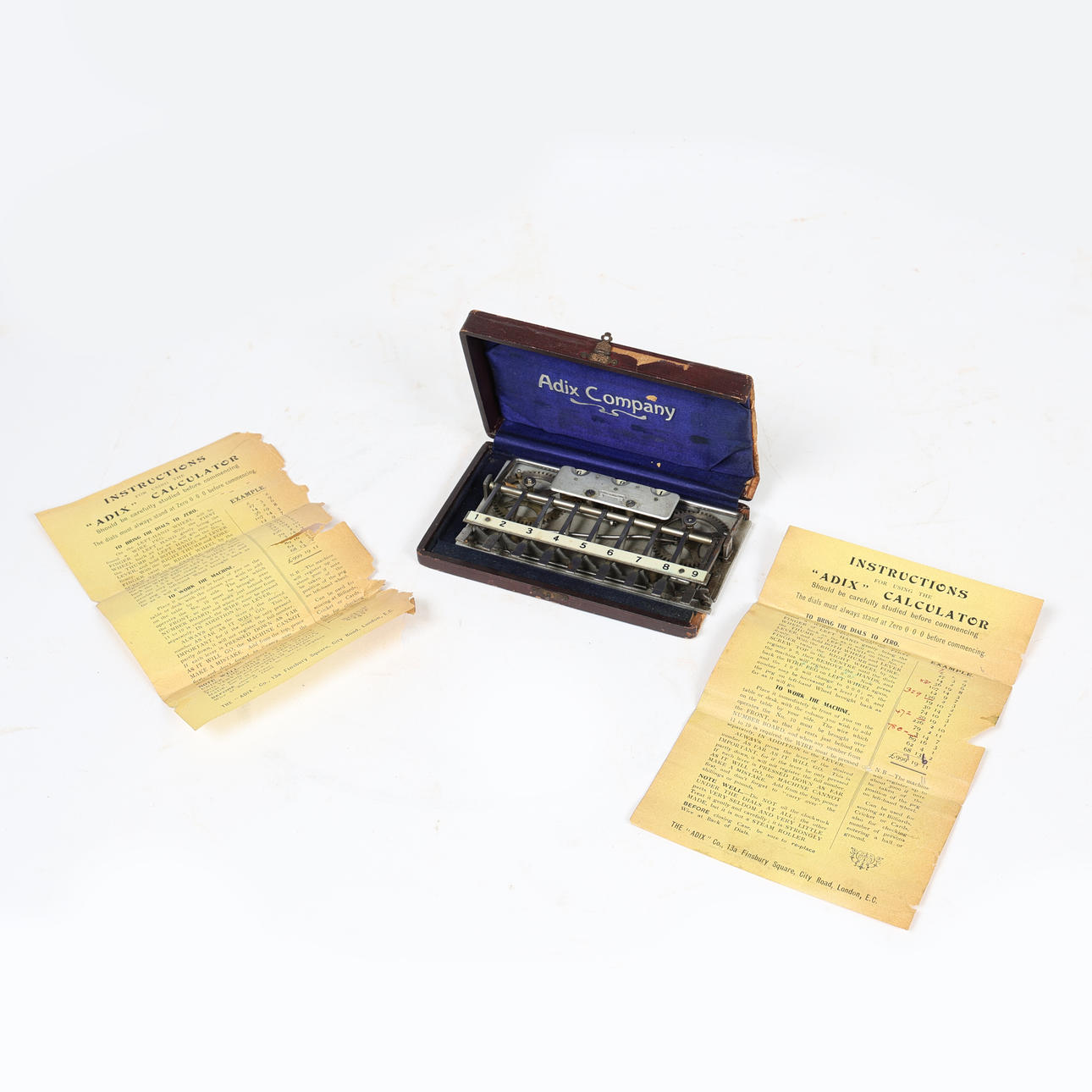 AN EARLY 20TH CENTURY ADIX COMPANY MECHANICAL ADDING MACHINE.