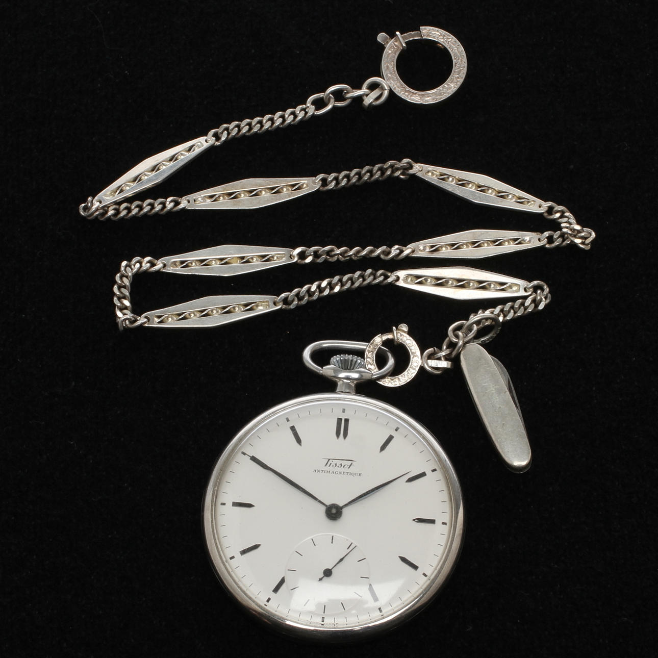 FICKUR, Tissot, cal. 38.2, boett av stål samt KLOCKEDJA silver, 1900-tal.