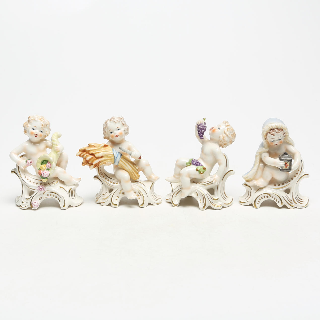 CUATRO FIGURAS DE PORCELANA GOEBEL.