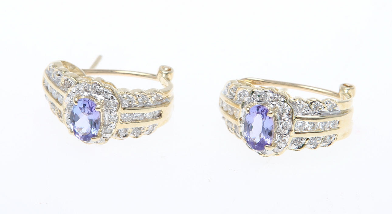 ÖRHÄNGEN. 1 par 14k guld med diamanter och tanzanite, ca 6 gram.