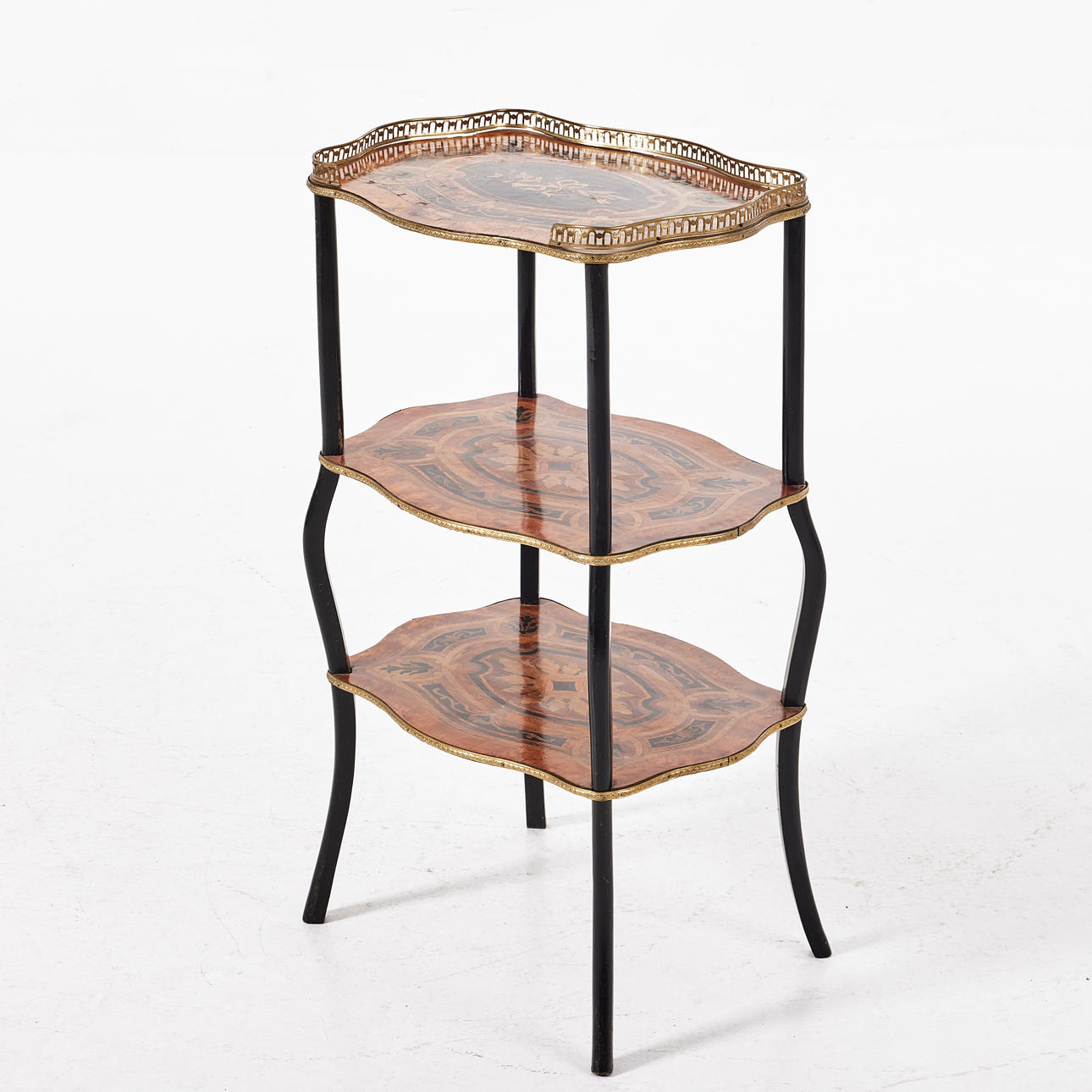 A FLOOR TABLE, circa 1900. Intarsia, with brass sills.