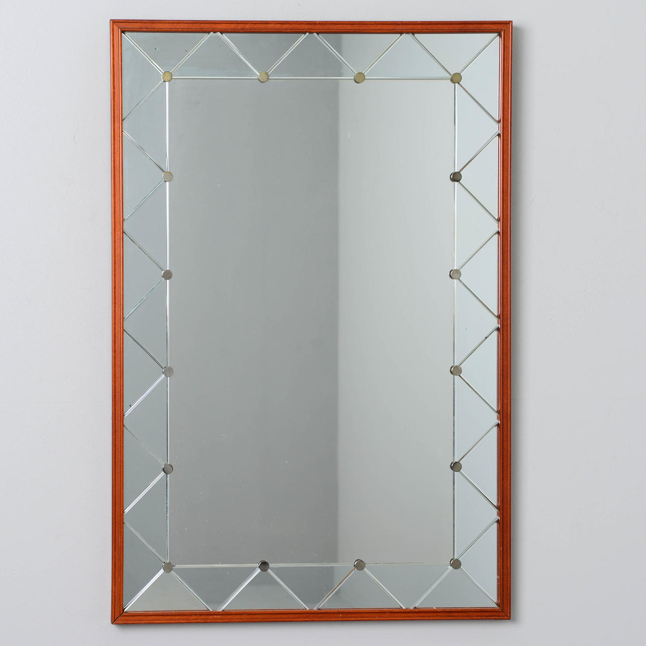A mirror, marked SCO, mid 20th century.