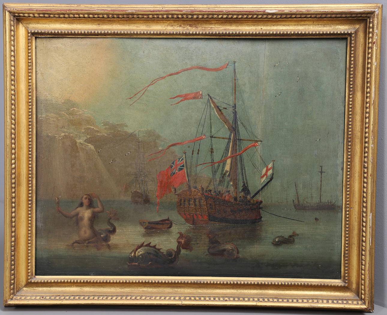 FOLLOWER OF PETER MONAMY (1681-1749). A CUTTER, FLYING THE RED ENSIGN AND THE ENGLISH FLAG, WITH AN ICHTHYOCENTAUR AND SEA CREATURES IN THE FOREGROUND.