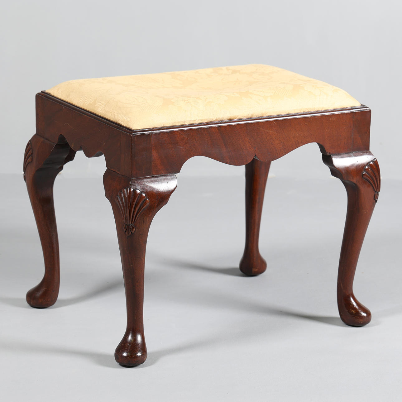 A GEORGE III STYLE MAHOGANY STOOL.
