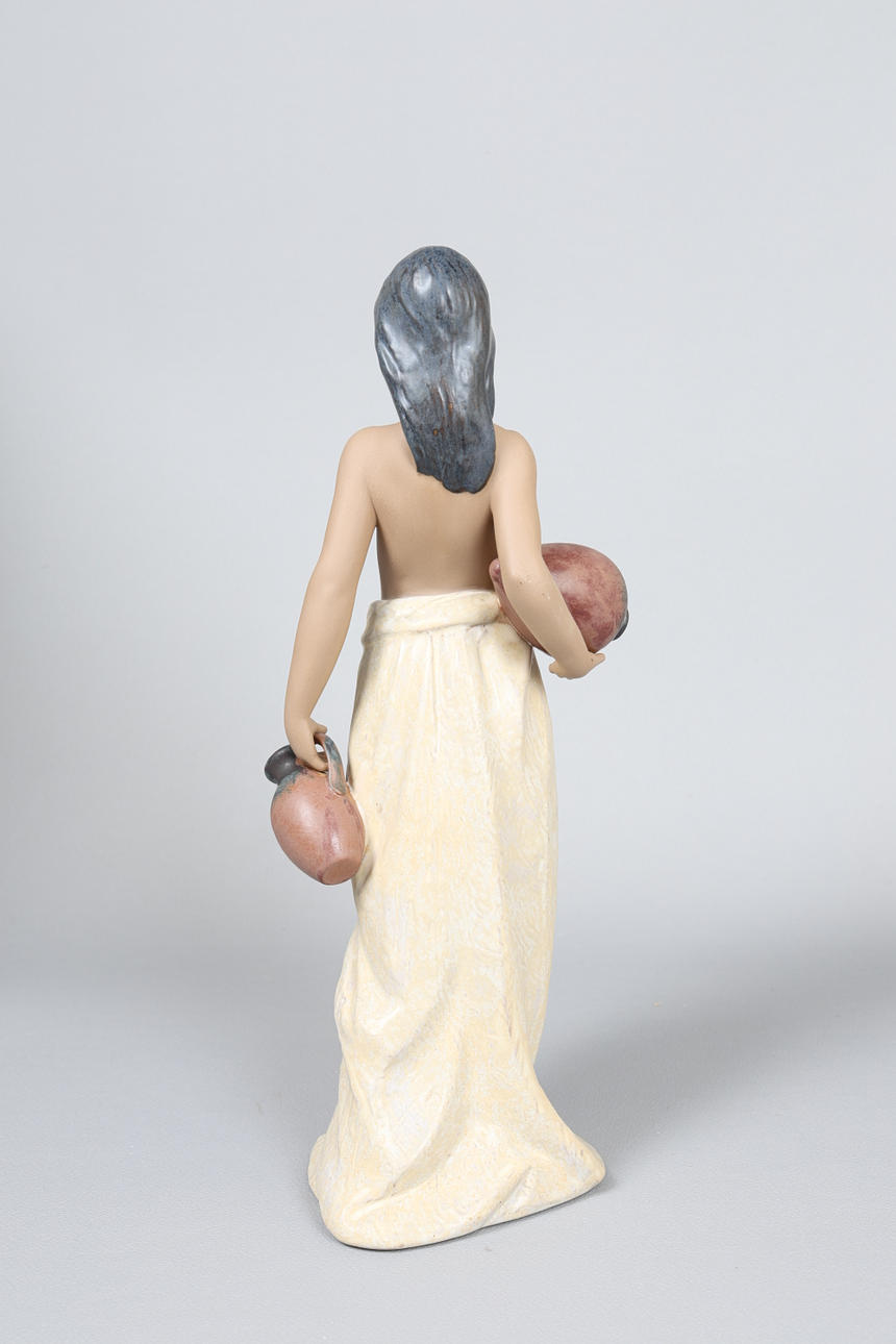 A LLADRO FIGURINE 'WATER GIRL' BOXED. Ceramics & Porcelain