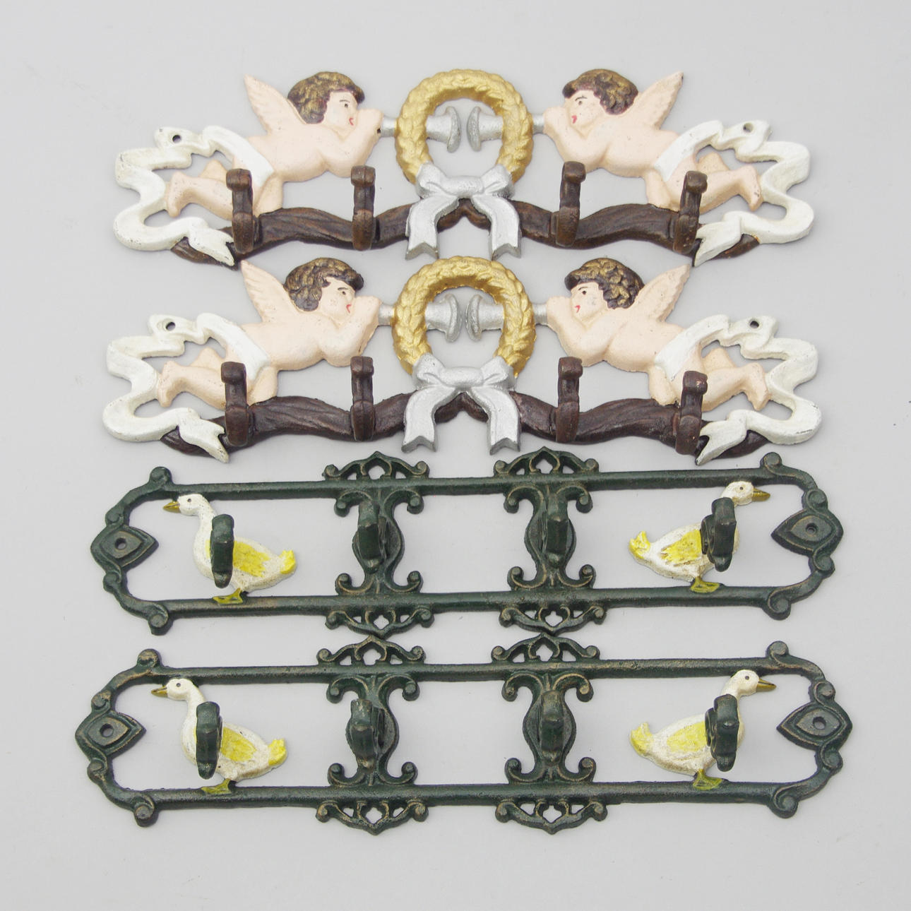 KLÄDHÄNGARE, 2 par, målad gjutjärn, samtida.