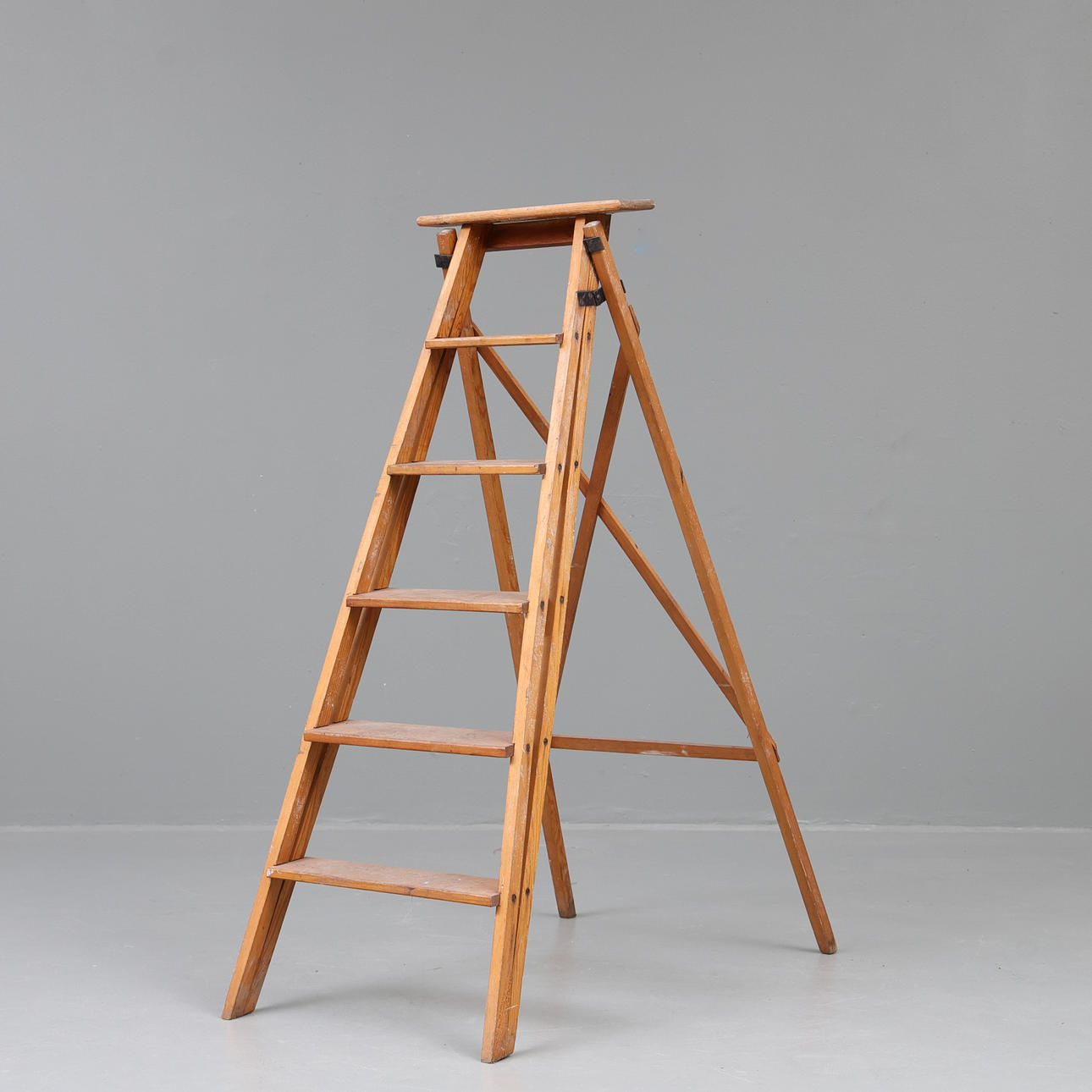 A 20th century painted pine ladder.