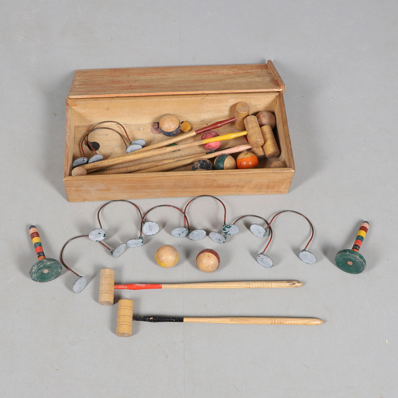 A VINTAGE TABLE CROQUET SET.