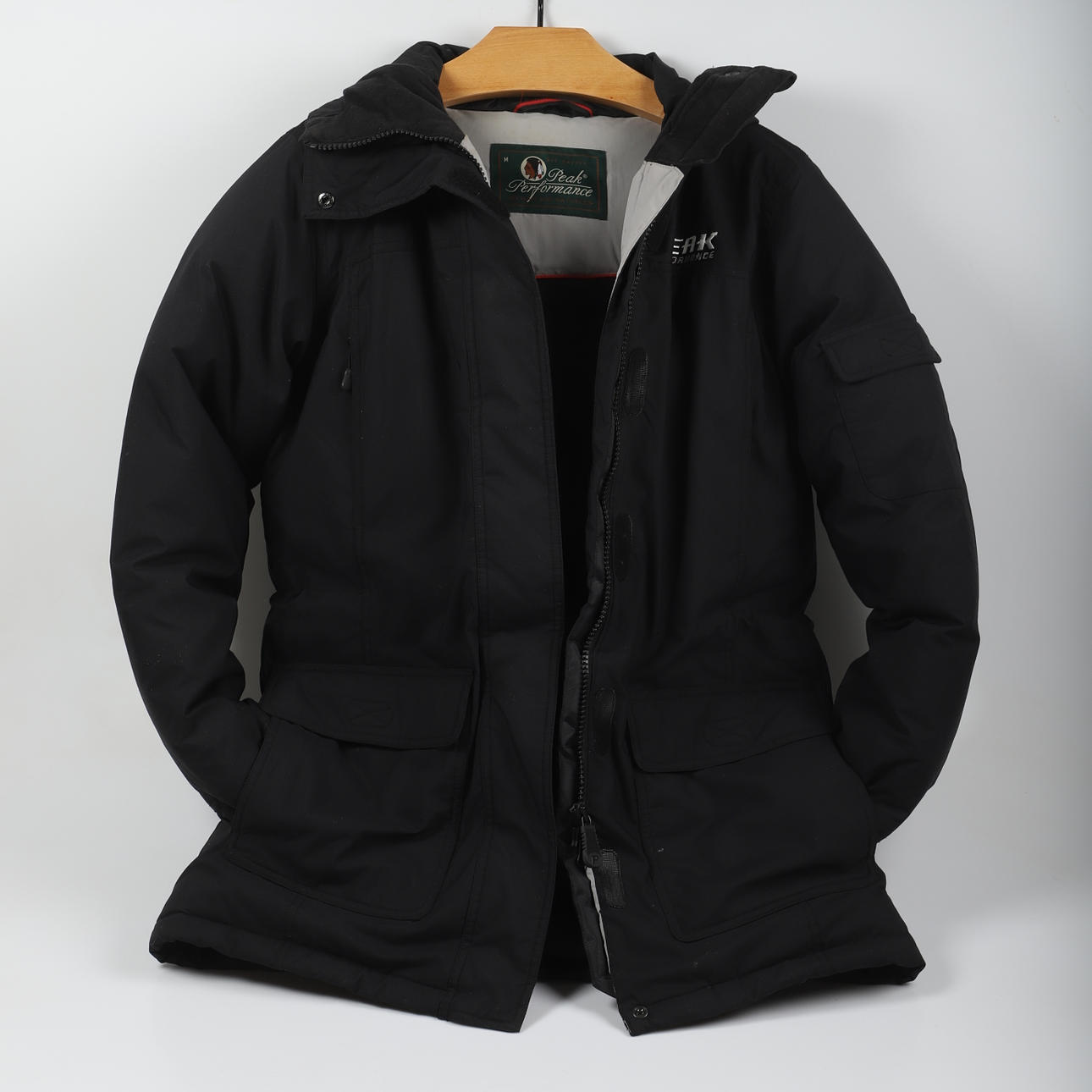 JACKA MED KAPUSCHONG, dun, Peak Performance.