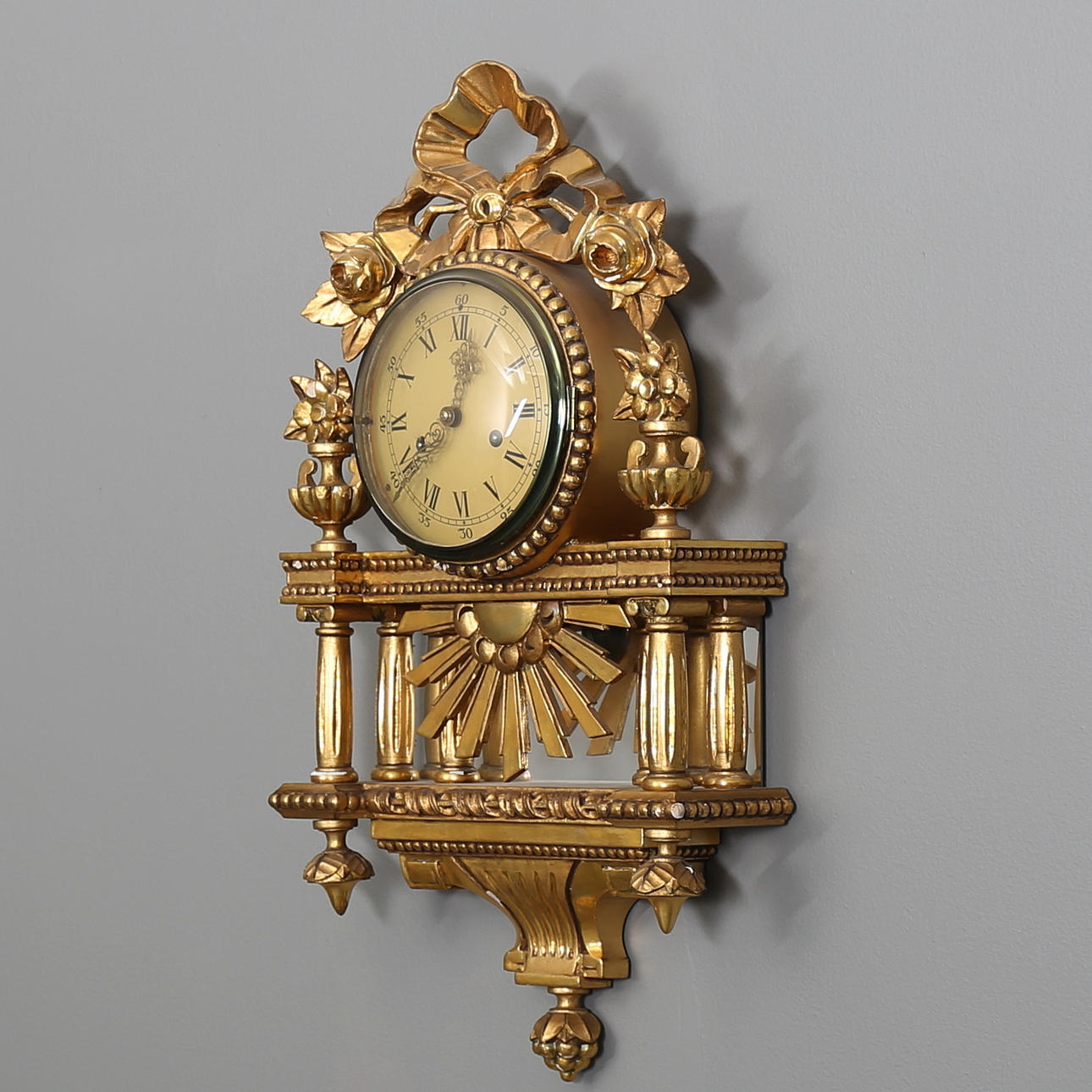 PENDULUM WALL CLOCK, Gustavian style, gilded, 20th century.