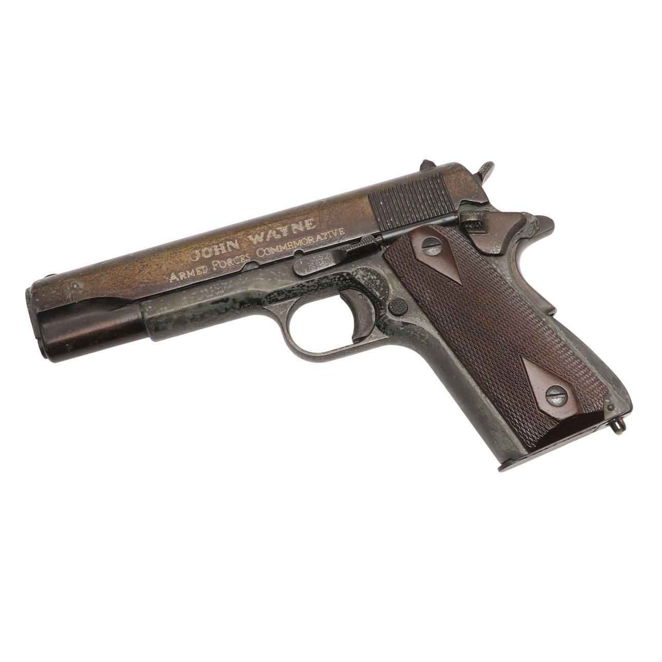 A JOHN WAYNE COMMEMORATIVE REPLICA COLT PISTOL.